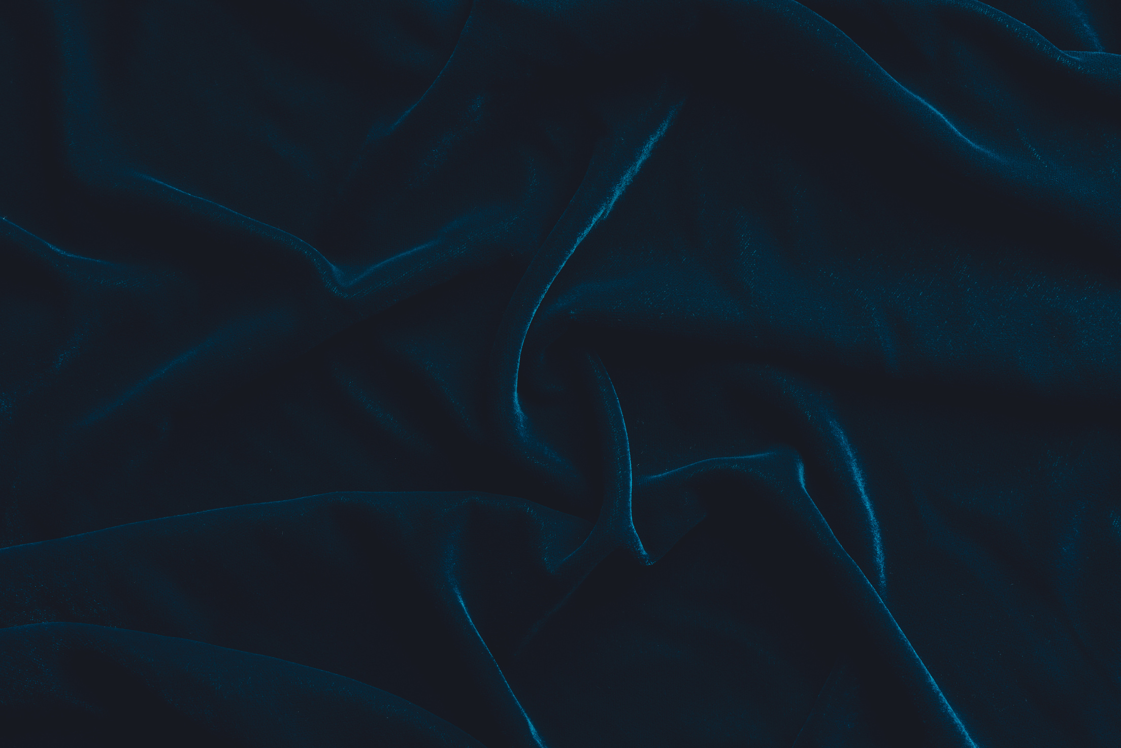 Luxurious dark blue velvet fabric background