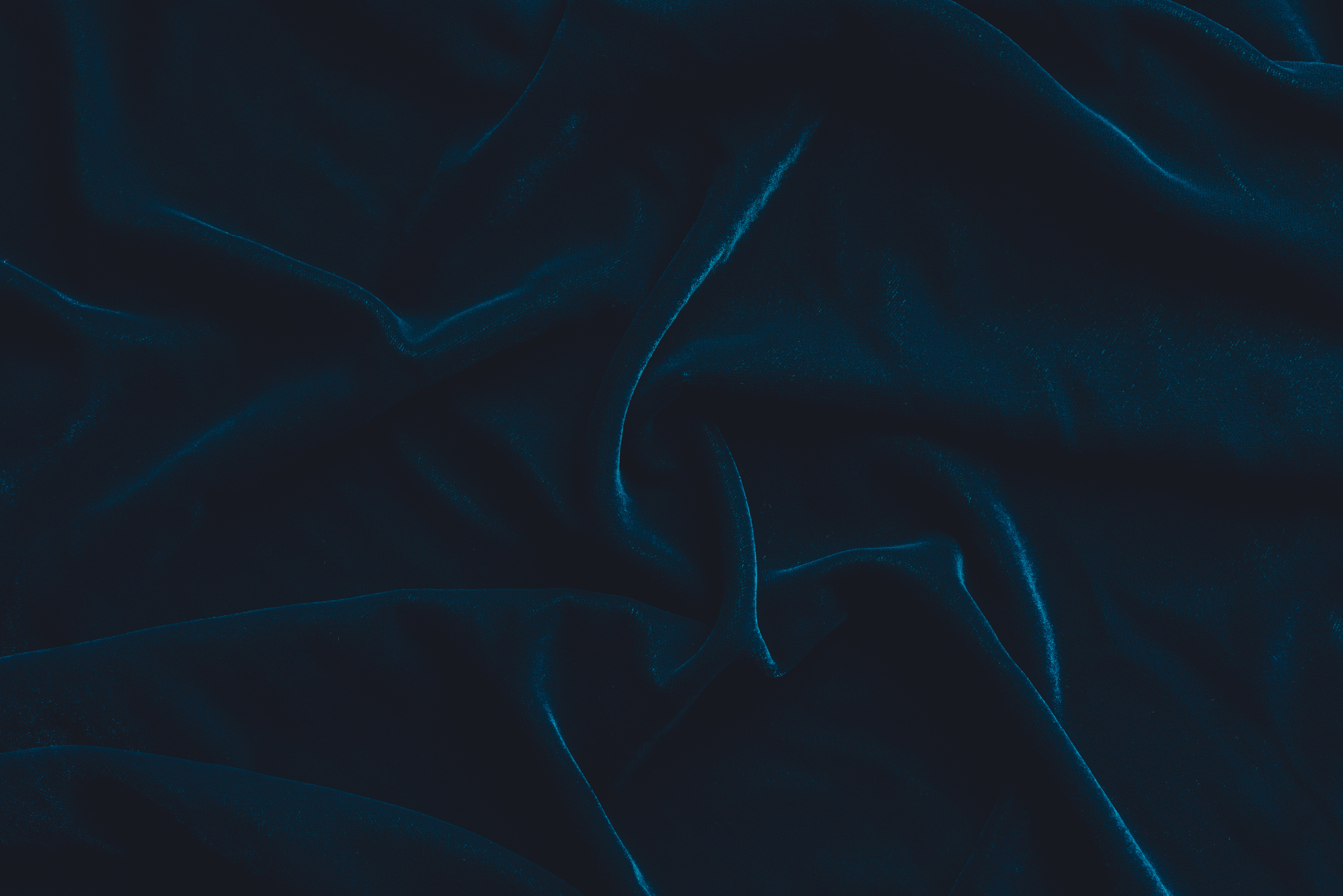 Luxurious dark blue velvet fabric background